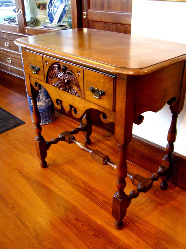 A RARE table made from wood removed from the Orlop deck of "OLD IRONSIDES" (the U S S Constitution) in 1929